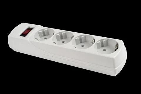 Electric extender isolated. The surge protector isolated on black backgroun.. Foto stock