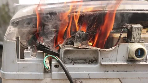 Electric fire caused by a short circuit in washing machine. Stock Footage 296580178