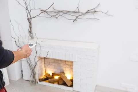 Electric fireplace remote control Stock Photos