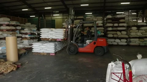 Electric Forklift Drives Up The Sacks Stock Footage 61491644