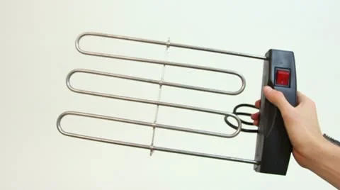 Electric grill outlet heating element