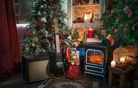 Electric guitar in cristmas interior Stock Photos
