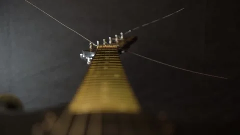Electric guitar on a dark background. Slow motion and close-up Video stock 131965552