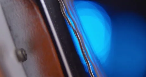 Electric Guitar, Macro Close up. Low E string warps and wobbles. Stock Footage 145770417