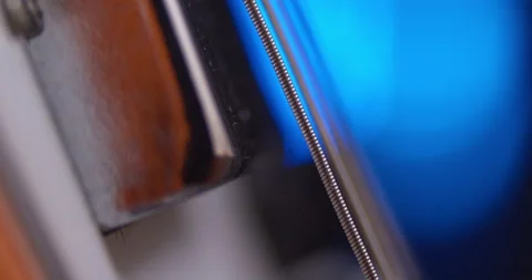 Electric Guitar, Macro Close up. Rack focus from high E to Low E string. Stock Footage 145770470