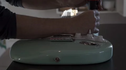Electric guitar maintenance Stock Footage 44829237