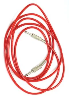 Electric guitar patch cable isolated on white Fotos de archivo