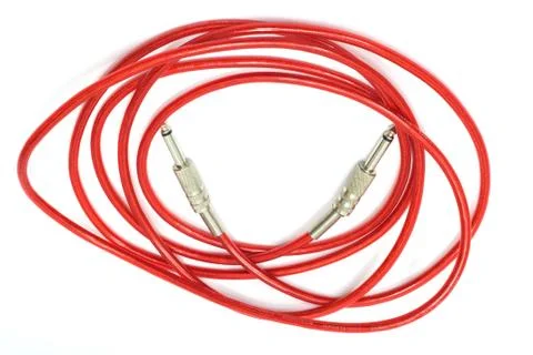 Electric guitar patch cable isolated on white Fotos de archivo