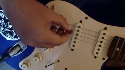 Electric guitar playing magnet testing fender squier Video stock 136814309