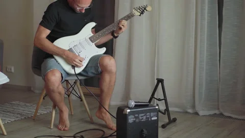 Electric guitar string instrument video. Man playing nylon strings during music Vidéo 306806444