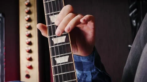 Electric guitar strings, close up. Vertical video. Musical instruments Video stock 241338415