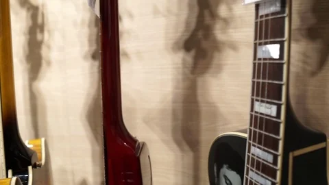 Electric Guitars Hanging on the store. Stock Footage 124672341