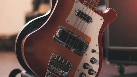 Electric Guitars on Rack Move In Close Up Stock Footage 89541046