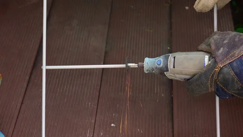 Electric hand-held cutting tools cutting steel Stock Footage 107695443