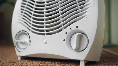 Electric heater shows temperature control settings Stock Footage 345016258