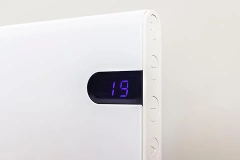 Electric heating radiator, close up of temperature, UK home Stock Photos