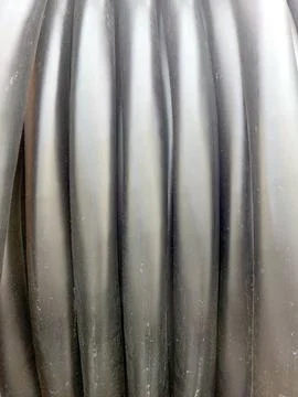 Electric High Voltage Cable Coiled on a Reel Ready for Installation on Cons.. Stock Photos