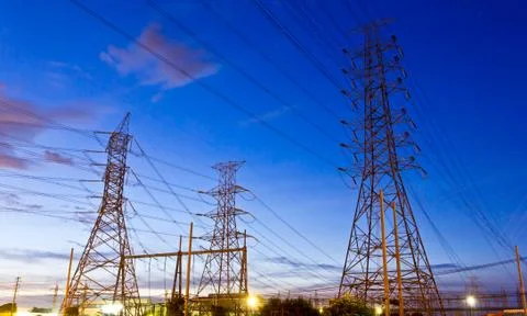 Electric high voltage post in night sky Stock Photos