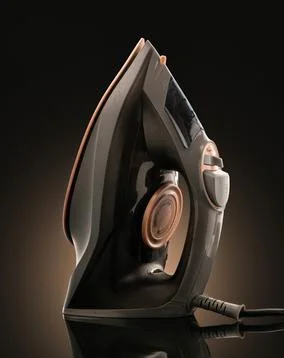 Electric iron on black background with reflection Stock Photos
