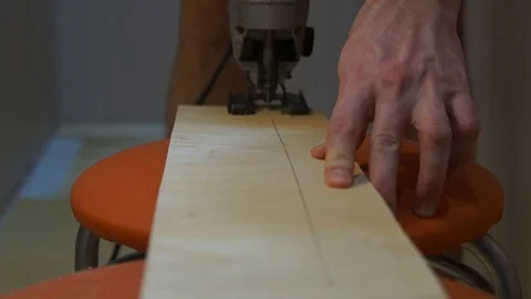 Electric jigsaw in action Stock Footage 86413384