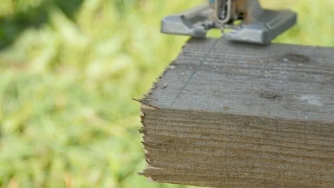 An electric jigsaw cuts the board. 스톡 동영상 77229694
