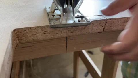 Electric jigsaw.  Work on chipboard material with a jigsaw. Stock Footage 288453318