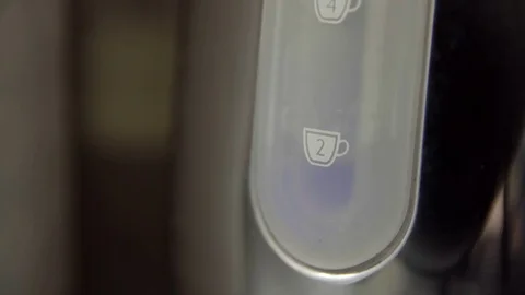 Electric kettle boiling water 4K stock footage Stock Footage 83044626