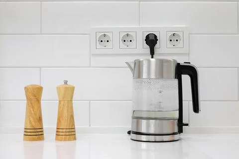 Electric kettle on the table in the kitchen 库存照片