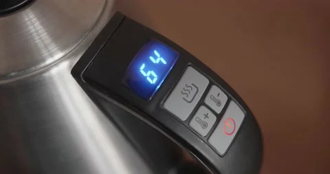Electric kettle with temperature indication Stock Footage 153106106