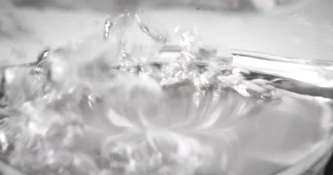 Electric kettle turning off automatically as water boiling inside close-up. View Stock Footage 237186471