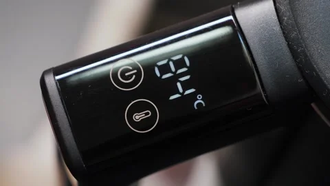 The electric kettles touch panel displays water temperature, making it Stock Footage 329666229