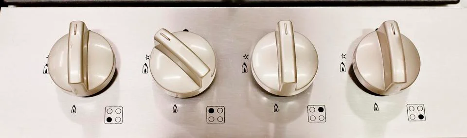 Electric kitchen stove control switch, black and white Stock Photos