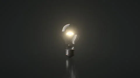 Electric Light Bulb in the Dark Turns On with Warm Light. Shining Lightbulb Like Stock-Footage 292801310