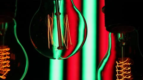 Electric light bulbs on a black background. Stock Footage 154168145