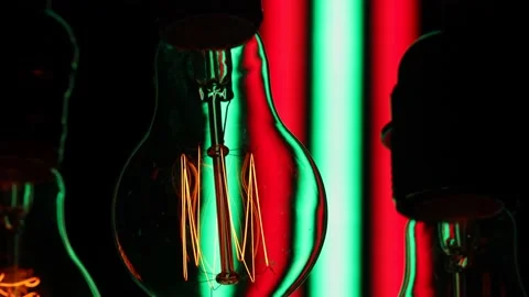 Electric light bulbs on a black background. Stock Footage 154168260