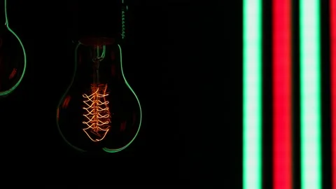 Electric light bulbs on a black background. Stock Footage 154683376