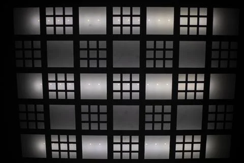 Electric light in elevator. Ceiling of elevator cabin. Lamps shine faintly. Foto stock