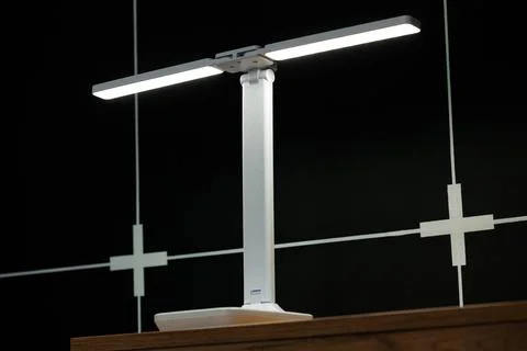 Electric light lamp interior object design in dark room style with square pan Stock Photos