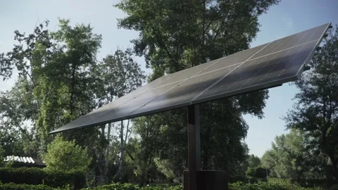 Electric light solar panel plate in park. Modern solar battery. Eco energy Stock Footage 152154764