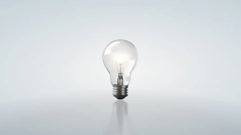 Electric Lightbulb Turns On with Warm Light. Shining Light Bulb Like Idea Symbol 스톡 동영상 292888271