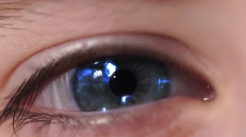 Electric Lightnings in Eye. An Eye Blinks and Changes Color to the Blue. Video stock 60583232