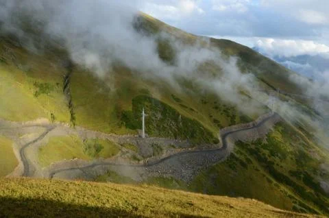Electric line on road from Lower to Upper Svaneti, Caucasus mountains, Georgia Stock Photos