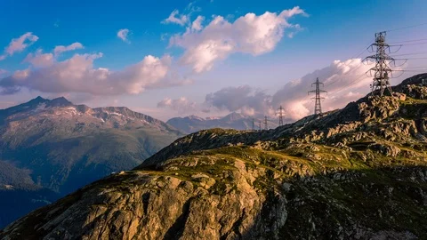 Electric lines over Grimsel mountain, Switzerland time lapse Stock Footage 119058949