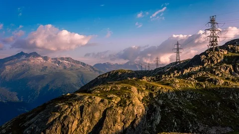 Electric lines over Grimsel mountain, Switzerland time lapse Stock Footage 119058970