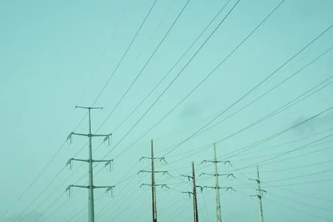 Electric lines on sky background. Stock Photos