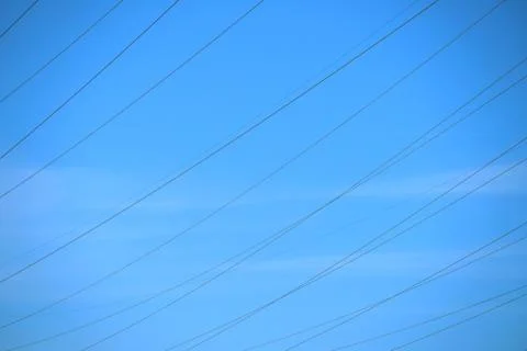Electric lines on sky background. Stock Photos