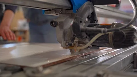 Electric machine for cutting ceramic tiles with water. The process of cutting Stock Footage 267672772