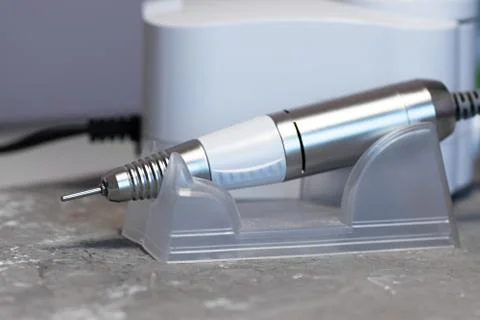 Electric machine to remove the nail polish. Device for manicure. Stock Photos