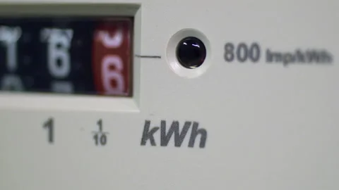 Electric meter and kWh symbol. A flashing red LED light Stock Footage 218616111