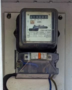 Electric meter on the wall Stock Photos